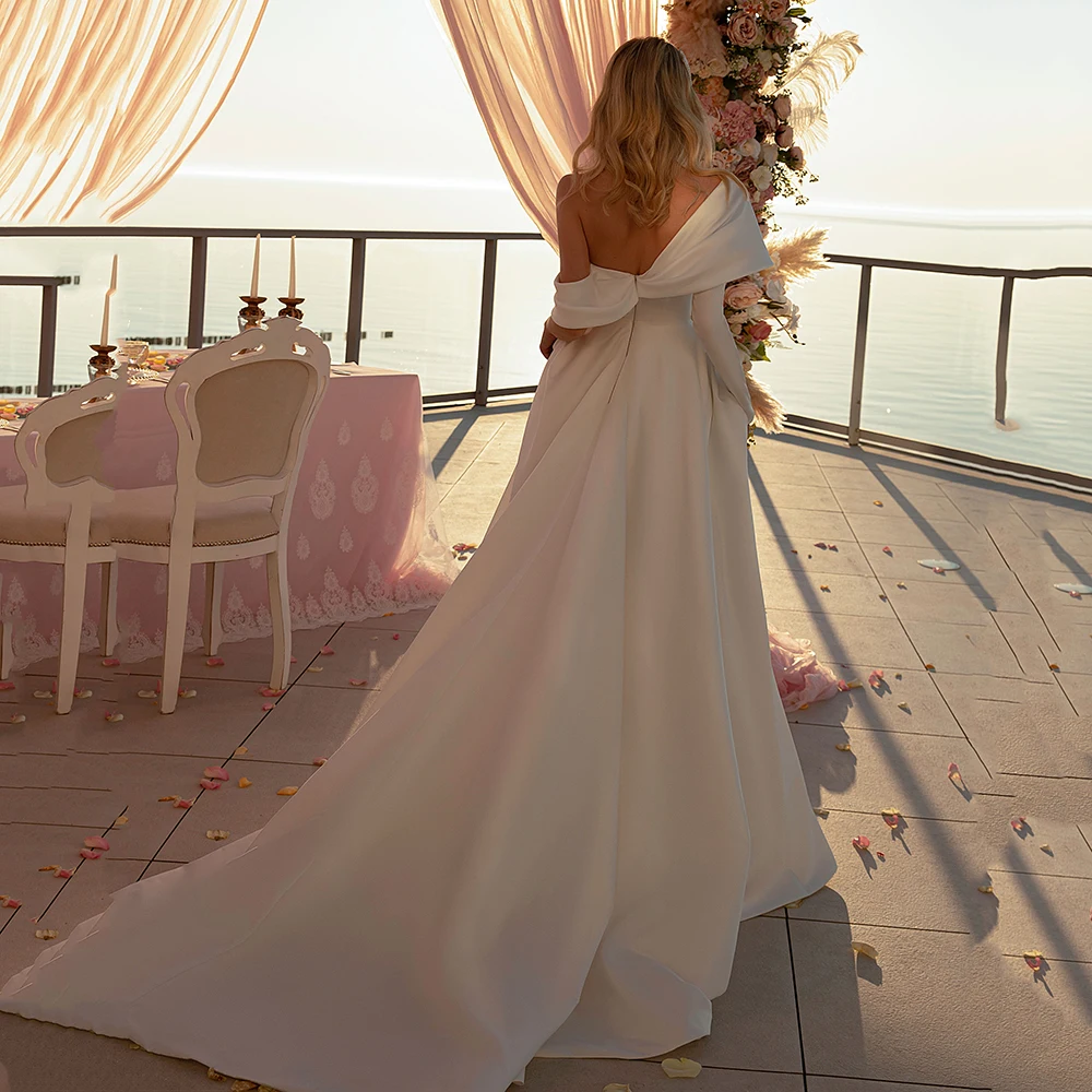 UZN Modern A-Line Satin Wedding Dress Sweetheart Off The Shoulder Straps Bridal Gowns High Slit Wedding Gown 2023 Robes De Marié
UZN Modern A-Line Satin Wedding Dress Sweetheart Off The Shoulder Straps Bridal Gowns High Slit Wedding Gown 2023 Robes De Marié