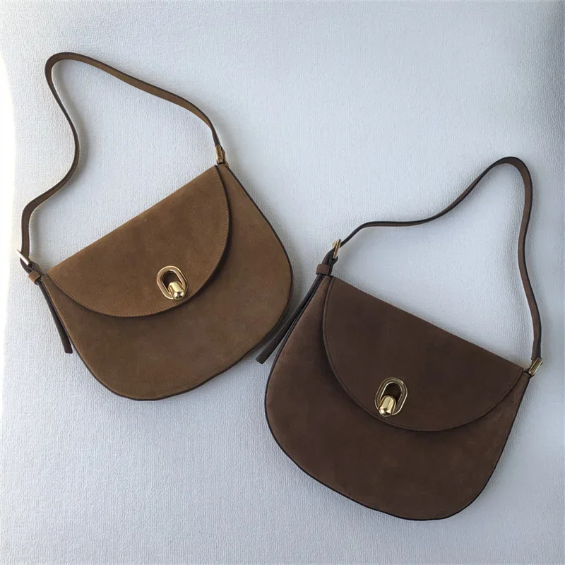 Niche design Savette tondo hobo Ladies anti-fur minimalist commuter shoulder underarm bag phone bag
Niche design Savette tondo hobo Ladies anti-fur minimalist commuter shoulder underarm bag phone bag