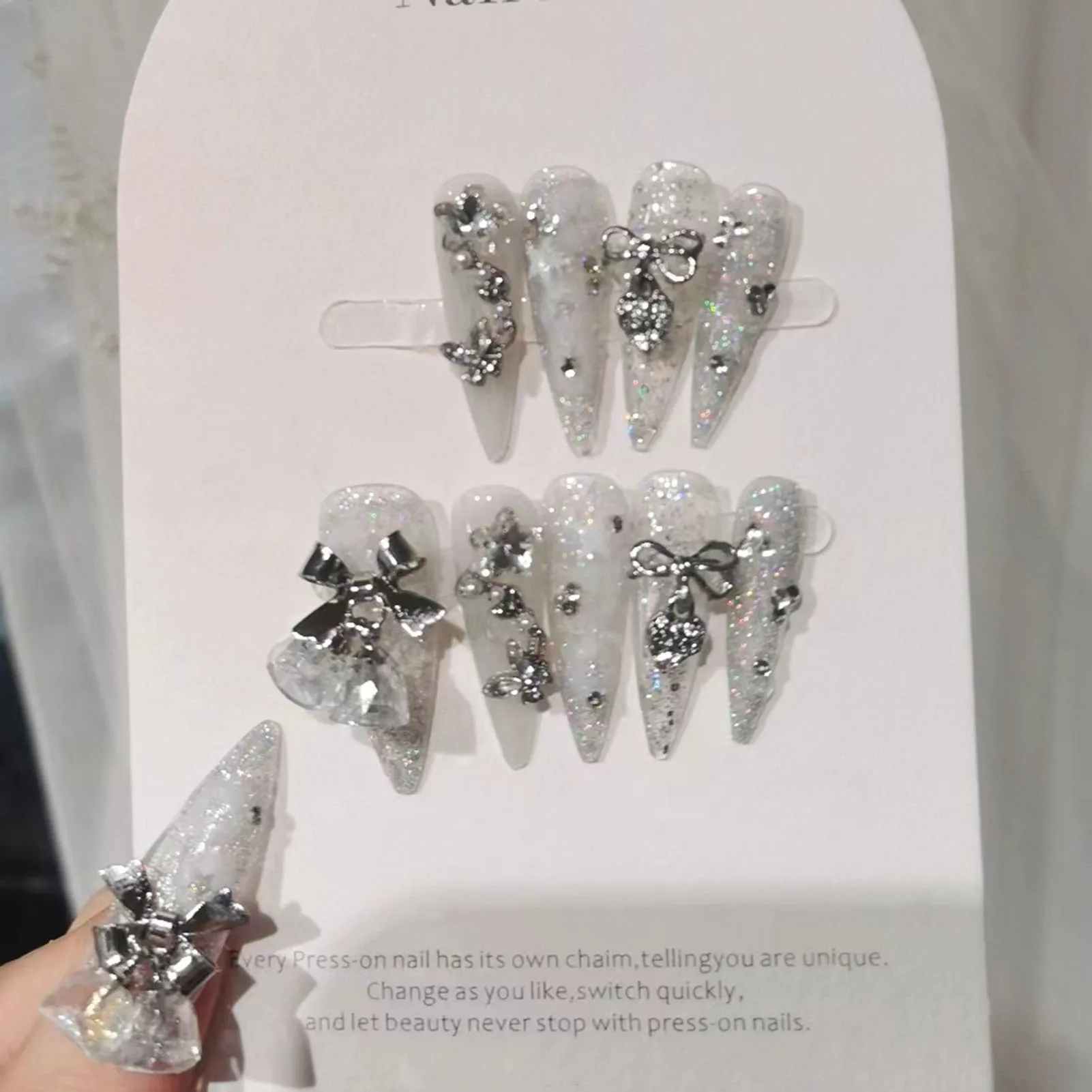 10pcs Elegant Stiletto Fake Nails 3D Bell and Decor Glittering Artificial Nail for Women and Girls Nail Decoration
10pcs Elegant Stiletto Fake Nails 3D Bell and Decor Glittering Artificial Nail for Women and Girls Nail Decoration