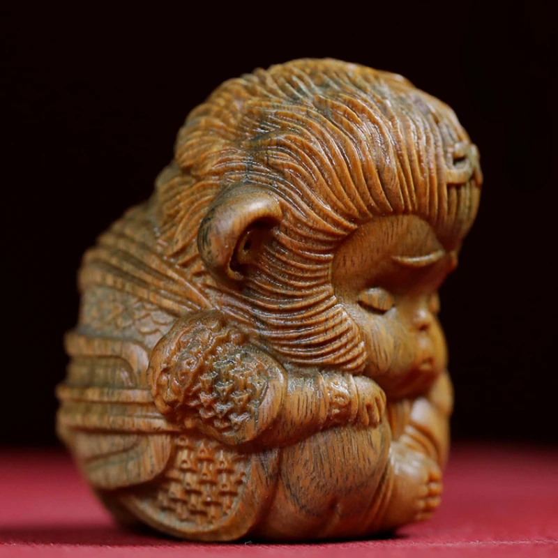 Green sandalwood carving Sun Wukong literary player hand a lovely zodiac monkey creative tabletop arts gifts home decor 
Green sandalwood carving Sun Wukong literary player hand a lovely zodiac monkey creative tabletop arts gifts home decor
