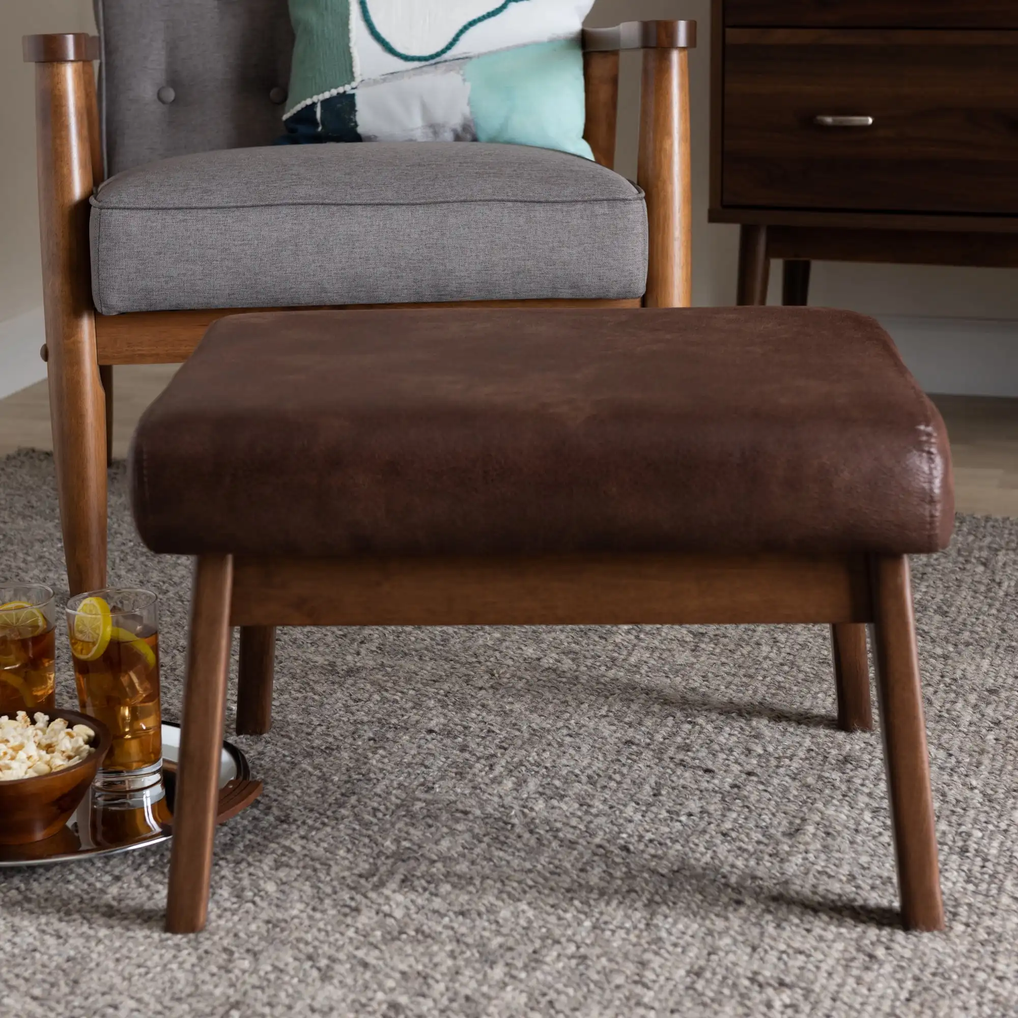 Bakari Mid-Century Modern Walnut Wood Dark Brown Distressed Faux Leather Ottoman
Bakari Mid-Century Modern Walnut Wood Dark Brown Distressed Faux Leather Ottoman