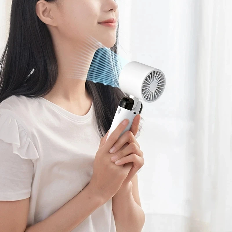 New Refrigeration Handheld Fan Desktop Folding Mini Mute Air Cooling Fan Mobile Phone Bracket Leafless Electric portable
New Refrigeration Handheld Fan Desktop Folding Mini Mute Air Cooling Fan Mobile Phone Bracket Leafless Electric portable