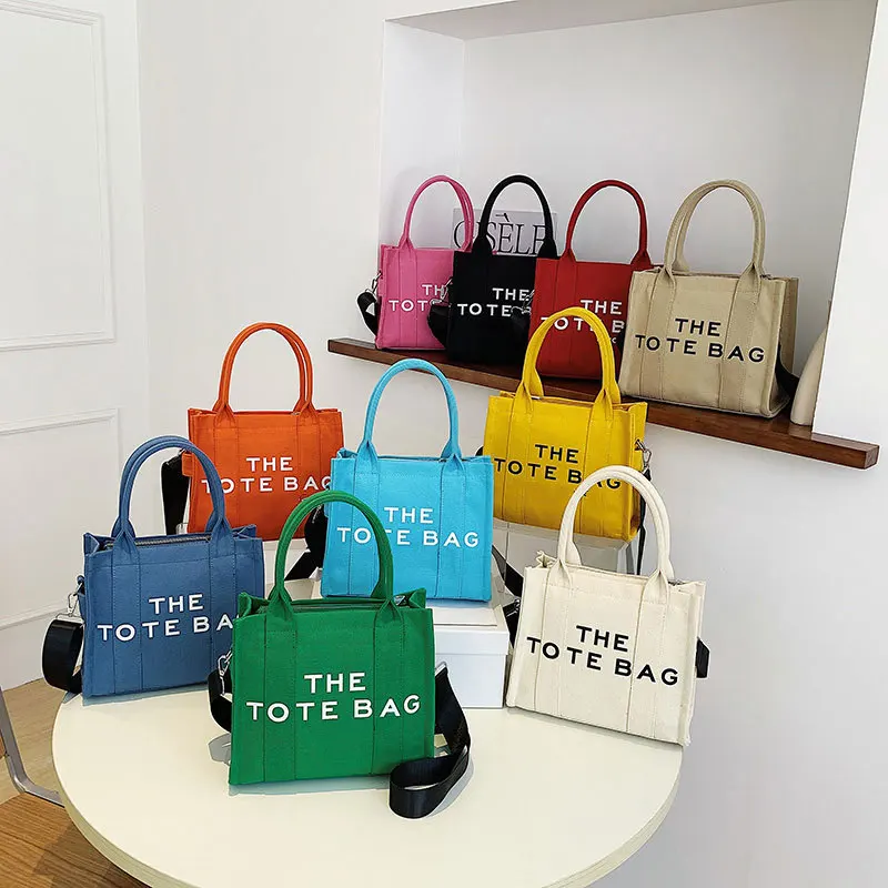 WINNIE 2023 ClassicThe Tote Bag Women's Bag New Fashion Printed Letter Canvas Handbag Luxury Brand Shoulder Crossbody Bags
WINNIE 2023 ClassicThe Tote Bag Women's Bag New Fashion Printed Letter Canvas Handbag Luxury Brand Shoulder Crossbody Bags