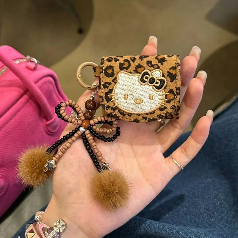 Hello Kitty Sanrio Kawaii Anime Iphone Earphone Case Cute Cartoon Leopard Print Bluetooth Ear Case Lovely Gifts for Girls
Hello Kitty Sanrio Kawaii Anime Iphone Earphone Case Cute Cartoon Leopard Print Bluetooth Ear Case Lovely Gifts for Girls