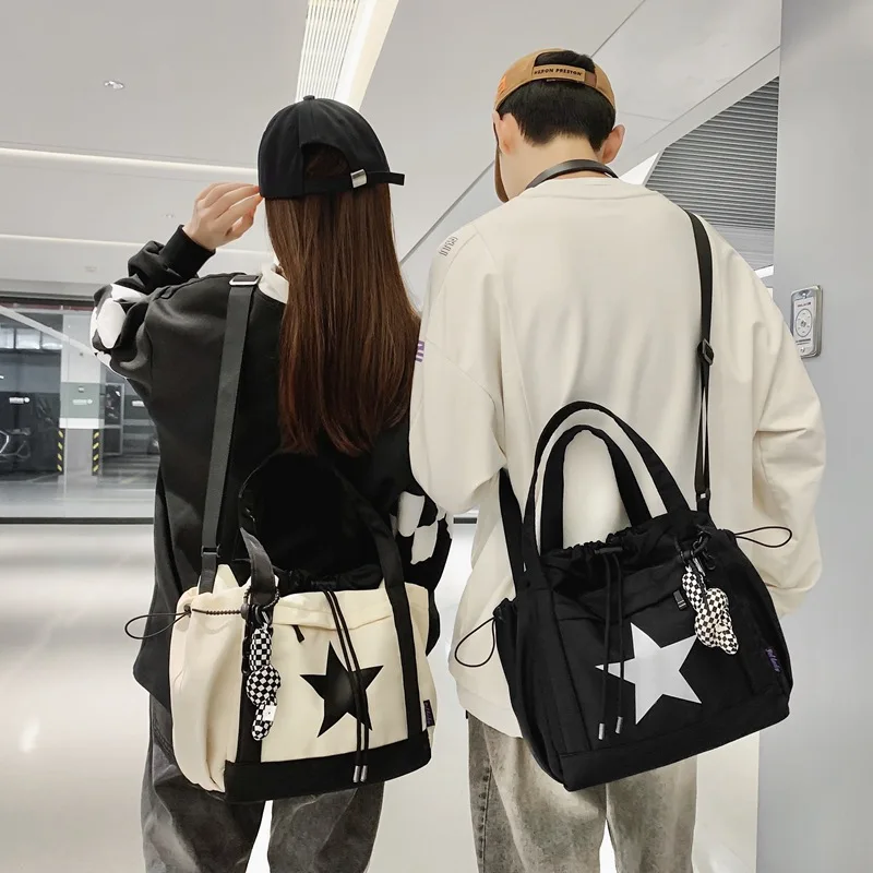 Personality Women Crossbody Bag Wholesale Large Capacity Couple Shoulder Bag New Casual Nylon Tote Bag Luxury Drawstring Handbag
Personality Women Crossbody Bag Wholesale Large Capacity Couple Shoulder Bag New Casual Nylon Tote Bag Luxury Drawstring Handbag