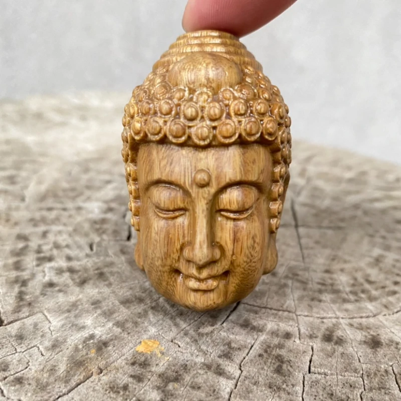 Green sandalwood carving crafts Buddha and magic between the hand a Buddha head pendant hand play piece home decor statue
Green sandalwood carving crafts Buddha and magic between the hand a Buddha head pendant hand play piece home decor statue