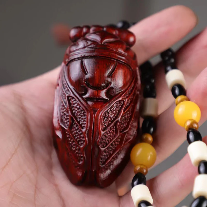 Small leaf rosewood carving handle pot Solid wood teapot hand pendant car hanging tray play home hanging ornaments
Small leaf rosewood carving handle pot Solid wood teapot hand pendant car hanging tray play home hanging ornaments