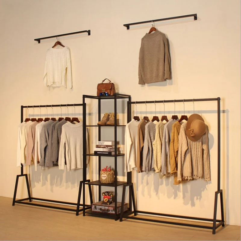 

Custom, Black Boutique Wall Mounted Clothing Display Rack Stand Retail Garment Store Interior Design