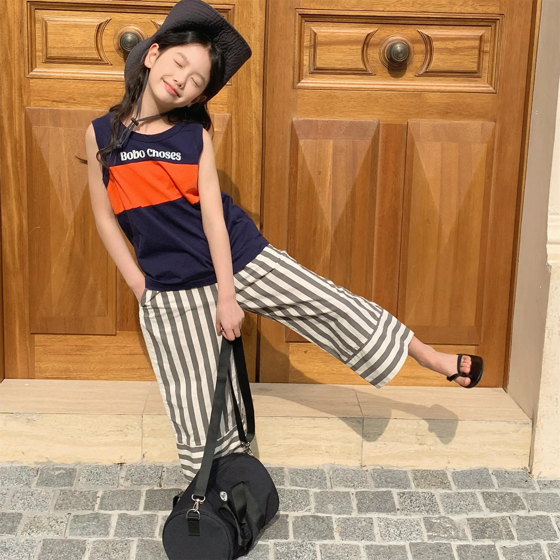 2025 Summer New Girls Sleeveless Vest Letter Print Boys T Shirts Cotton Children Casual Tops Loose Kids Tee Infant Clothes 7 S214fd2afc14044c394d38865f8668156w
