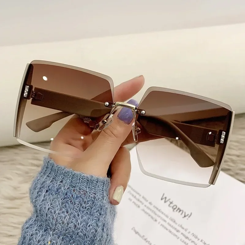 

New Frameless Cut Edge UV Resistant Sunshade Sunglasses for Trendy Women Popular on The Internet The Same Style of Sunglasses