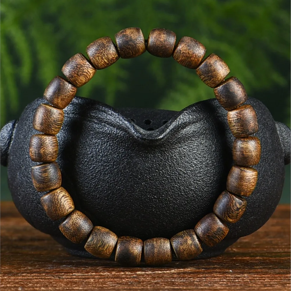 

Hainan National Incense Qi Nan Agarwood Bracelet about 9mm Buddha Beads Old-Shaped Beads Drum Beads Wenwan Wooden Bracelet