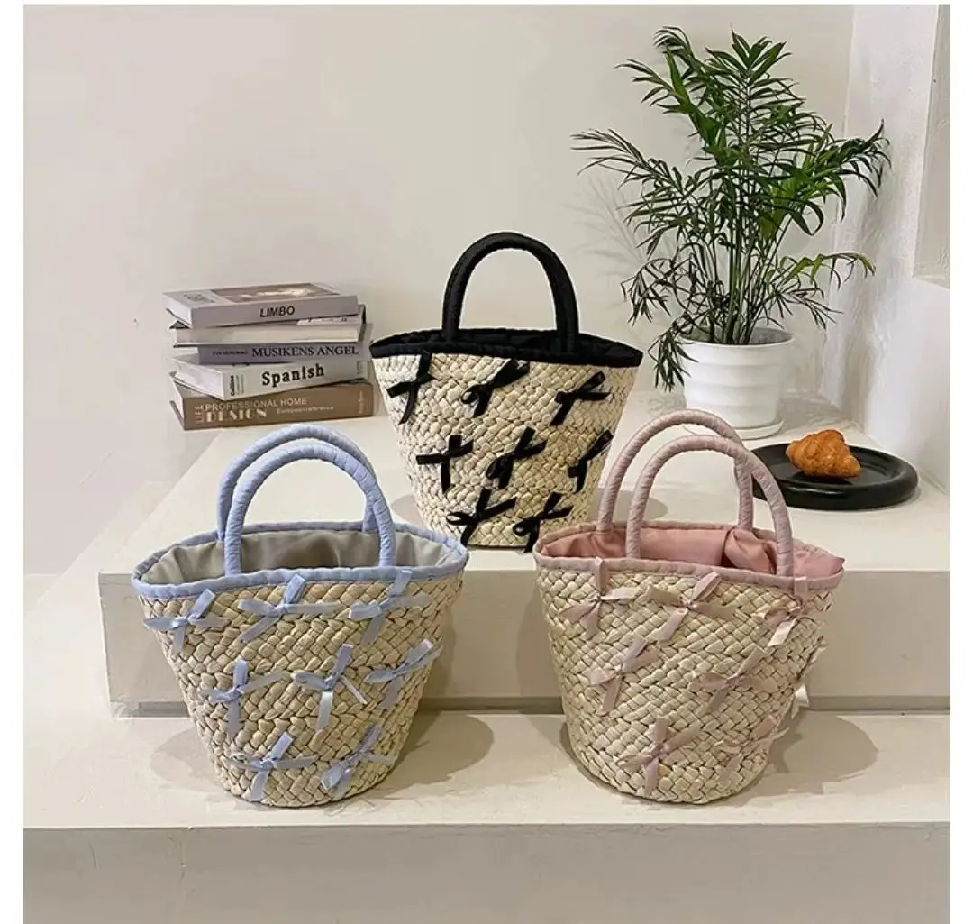 

2024New Niche Designer Luxury Retro Beach Vacation Woven Bag Exquisite And Versatile Bucket Bag High-end Casual Simple Straw Bag