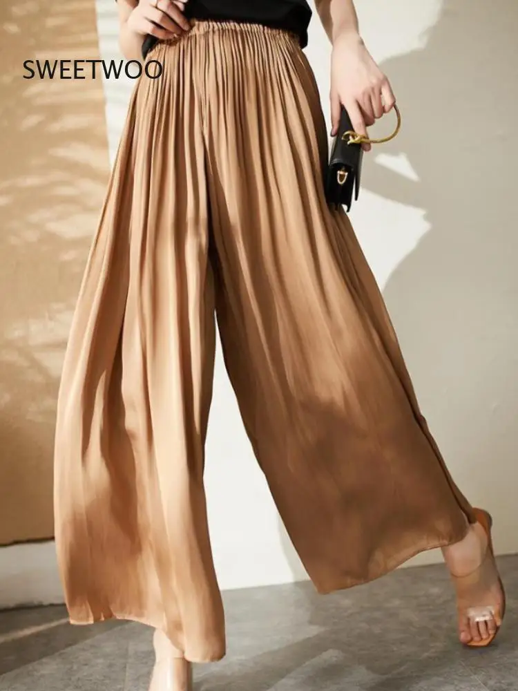 Summer New Women's Pants Temperament Romantic Pleated Elegant Soft Elastic Waist Loose Breathable Women's Wide Leg Skirt Pants 
Summer New Women's Pants Temperament Romantic Pleated Elegant Soft Elastic Waist Loose Breathable Women's Wide Leg Skirt Pants
