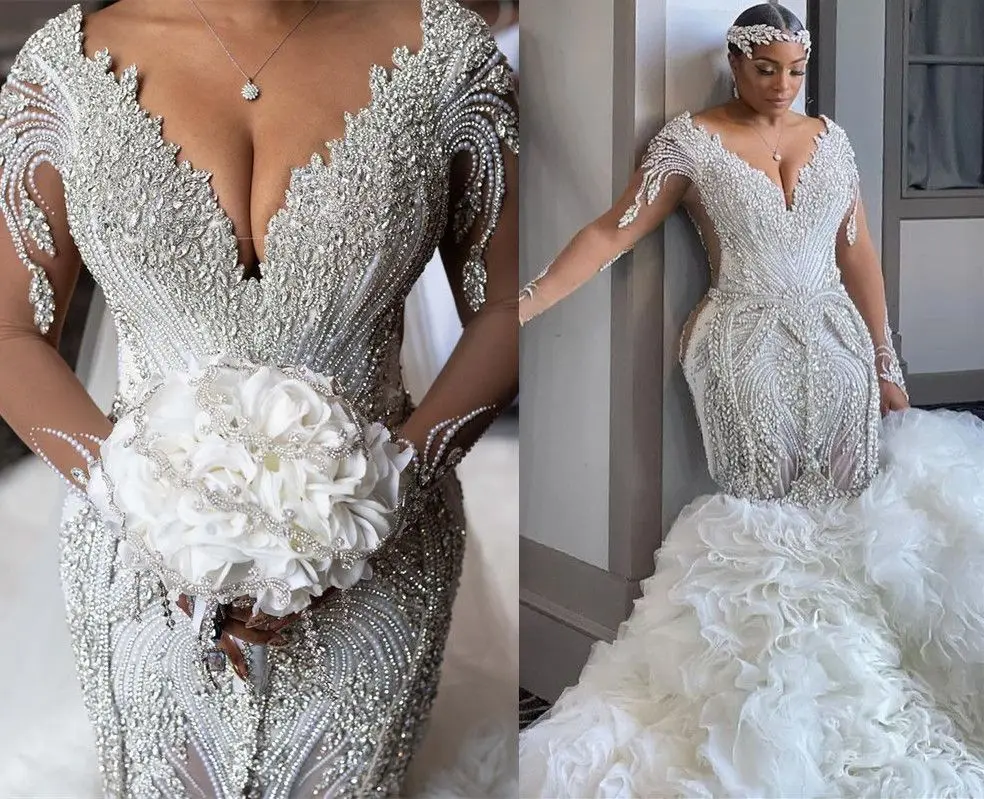 Plus Size Arabic Aso Ebi Luxurious Mermaid Sexy Wedding Dress Beaded Crystals Pearls Backless Long Sleeves Detachable Train Brid
Plus Size Arabic Aso Ebi Luxurious Mermaid Sexy Wedding Dress Beaded Crystals Pearls Backless Long Sleeves Detachable Train Brid