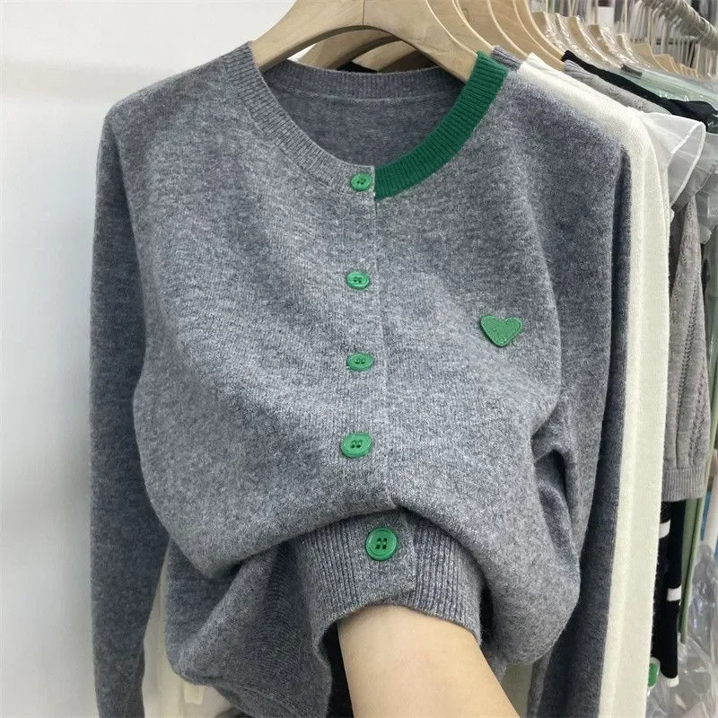 Spring and Autumn New Korean Gentle Knitted Cardigan Women Patch Long Sleeve Bottom Top Westernized Loose Sweater Female Coat
Spring and Autumn New Korean Gentle Knitted Cardigan Women Patch Long Sleeve Bottom Top Westernized Loose Sweater Female Coat