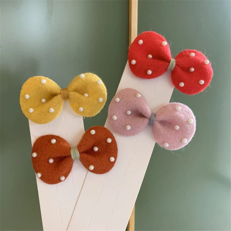 10pcs/Lot New Felt Hair Clips Imitation Pearl Hair Bows Hairpins Sweet Bowknot Hairgrips Princess Headwear Hair Accessories
10pcs/Lot New Felt Hair Clips Imitation Pearl Hair Bows Hairpins Sweet Bowknot Hairgrips Princess Headwear Hair Accessories