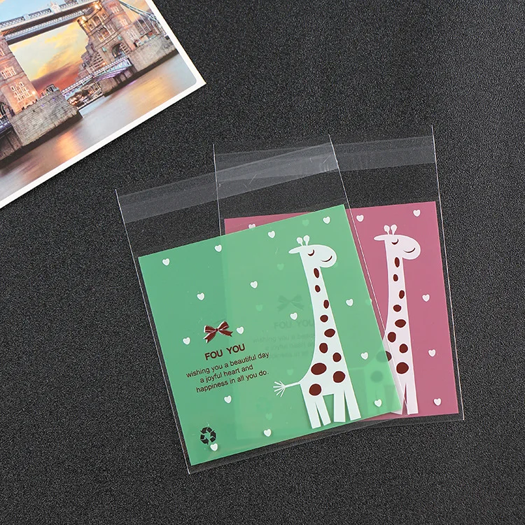 100pcs Lovely giraffe baked biscuits West Point self-adhesive bag wedding candy bag try decoration bag
100pcs Lovely giraffe baked biscuits West Point self-adhesive bag wedding candy bag try decoration bag