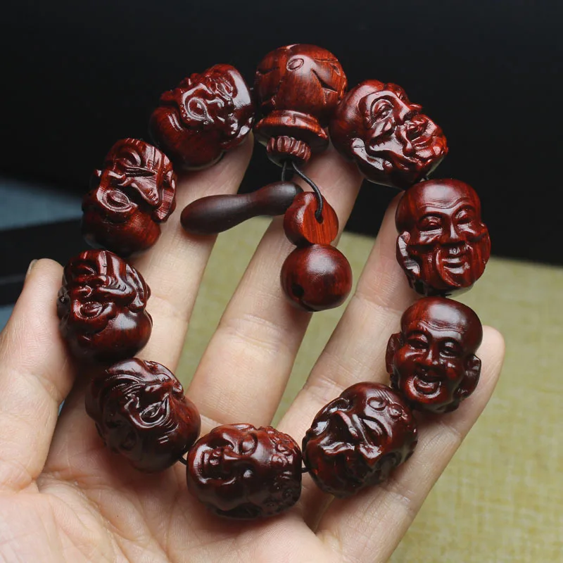 Rhinoceros horn red sandalwood eighteen Arhats hand string small leaf red sandalwood carving beads Buddha beads
Rhinoceros horn red sandalwood eighteen Arhats hand string small leaf red sandalwood carving beads Buddha beads