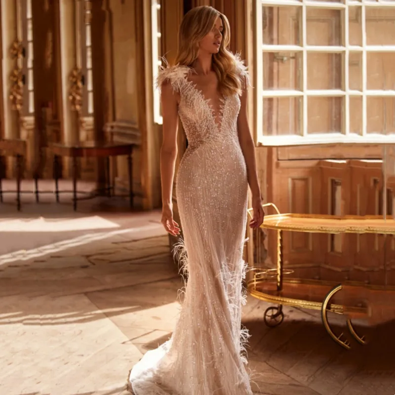Exquisite Mermaid Wedding Dress Spaghetti Straps Feathers Pearls Backless V-Neck Plain Bridal Gown Sweep Train Vestido De Novia
Exquisite Mermaid Wedding Dress Spaghetti Straps Feathers Pearls Backless V-Neck Plain Bridal Gown Sweep Train Vestido De Novia