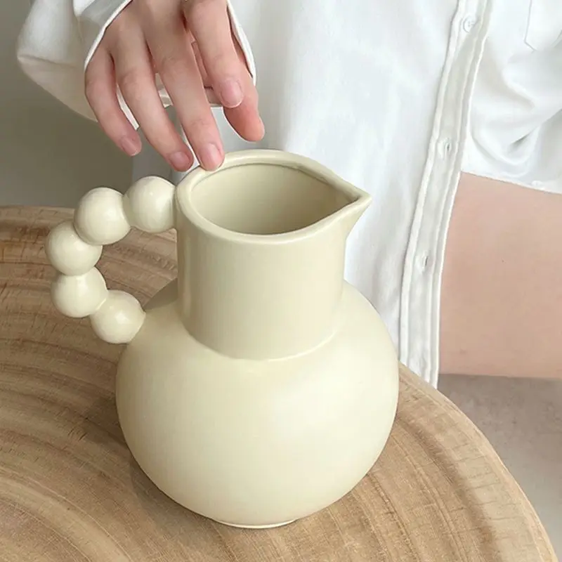 French Cream Handle Vase Milk Pot Ceramic Flowerpot Decoration Living Room Bedroom Dining Room Hotel Desktop Home Decor Ins Styl
French Cream Handle Vase Milk Pot Ceramic Flowerpot Decoration Living Room Bedroom Dining Room Hotel Desktop Home Decor Ins Styl