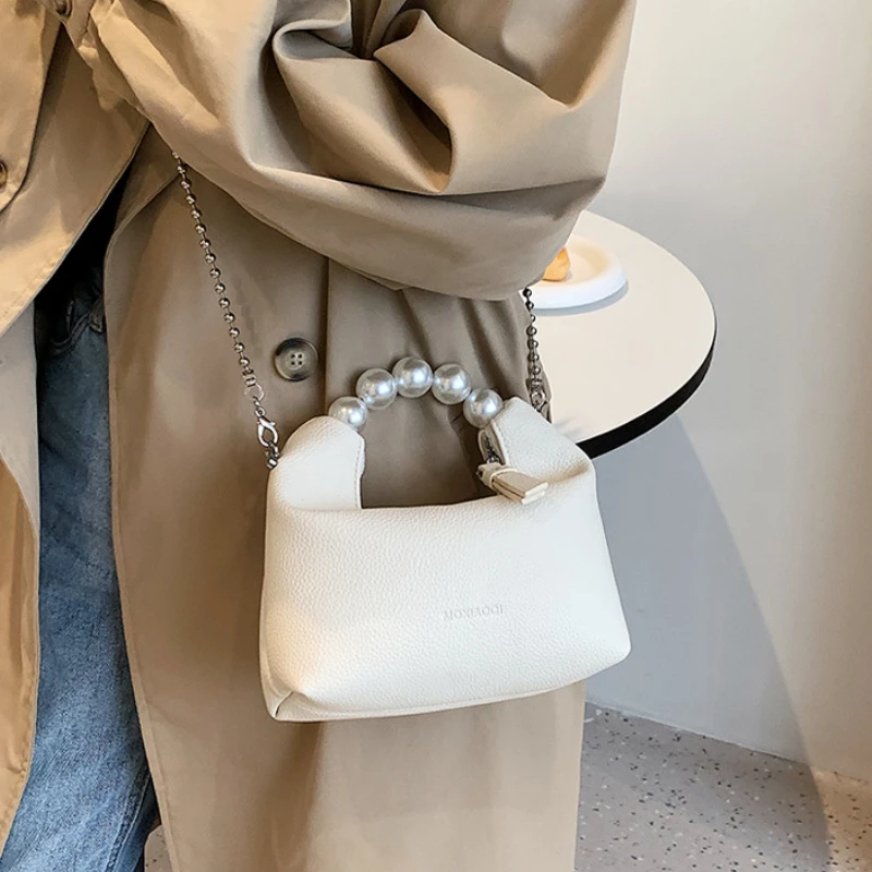 Retro Girl Age Reducing Pearl Handheld Dumpling Bag Fashion Candy Colors Chain One Shoulder Crossbody Messenger Satchel Bag
Retro Girl Age Reducing Pearl Handheld Dumpling Bag Fashion Candy Colors Chain One Shoulder Crossbody Messenger Satchel Bag