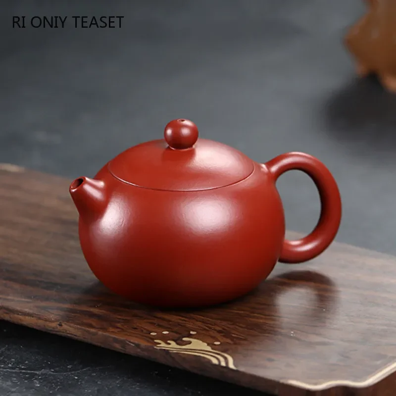 Yixing High-end Purple Clay Teapot Handmade Ball Hole Filter Xishi Tea Pot Raw Ore Dahongpao Kettle Chinese Zisha Tea Set
Yixing High-end Purple Clay Teapot Handmade Ball Hole Filter Xishi Tea Pot Raw Ore Dahongpao Kettle Chinese Zisha Tea Set