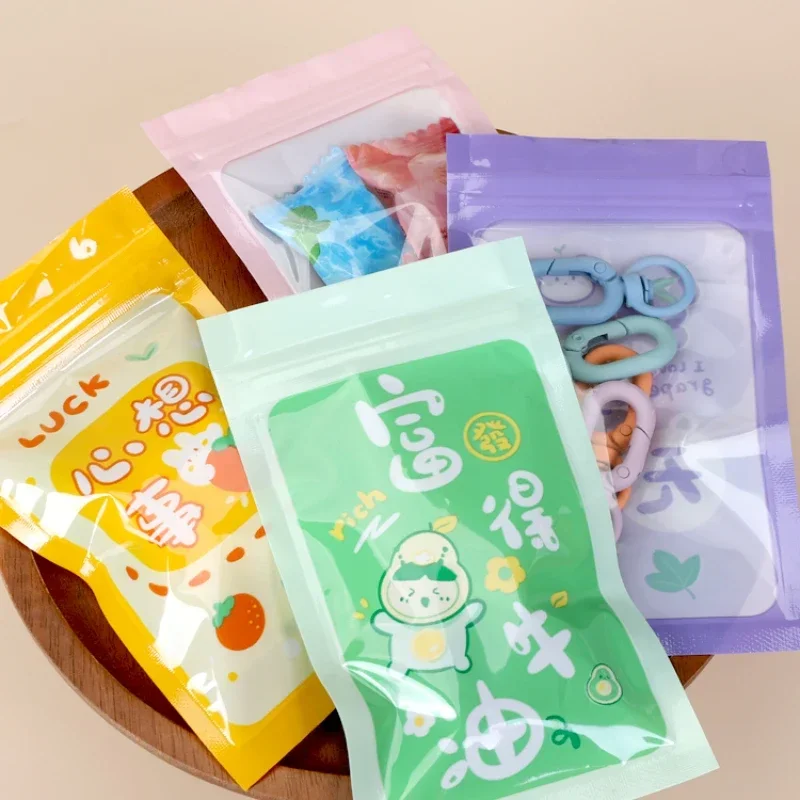 50 Piece Small Fresh Children's Snack Sharing Bag Cartoon Candy Chocolate QQ Sugar Sealed Packaging Bag Small Hairpin Bag
50 Piece Small Fresh Children's Snack Sharing Bag Cartoon Candy Chocolate QQ Sugar Sealed Packaging Bag Small Hairpin Bag