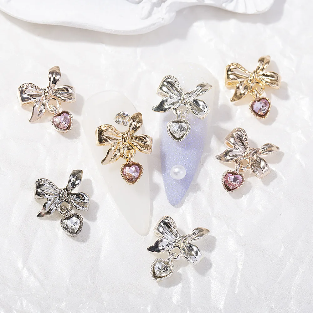 10pcs Luxury Alloy Exquisite Pendant Nail Art Decorations Gold Silver Bow Pentagram Design Nail Rhinestones Charms Wholesale DIY
10pcs Luxury Alloy Exquisite Pendant Nail Art Decorations Gold Silver Bow Pentagram Design Nail Rhinestones Charms Wholesale DIY