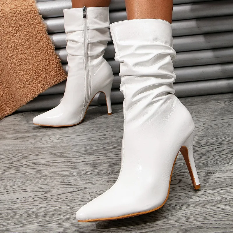 Зимние новые плиссированные женские сапоги, модные белые эластичные кожаные сапоги на молнии с острым носком на шпильке, привлекательные тонкие женские сапоги
Зимние новые плиссированные женские сапоги, модные белые эластичные кожаные сапоги на молнии с острым носком на шпильке, привлекательные тонкие женские сапоги