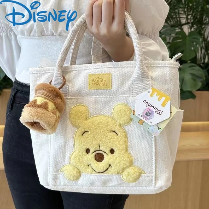 Новая Оригинальная подвеска в виде Винни-Пуха из Диснея, милая пчелиный медведь, вместительная сумка через плечо, мультяшная Портативная сумка для девочек с аниме 
Новая Оригинальная подвеска в виде Винни-Пуха из Диснея, милая пчелиный медведь, вместительная сумка через плечо, мультяшная Портативная сумка для девочек с аниме