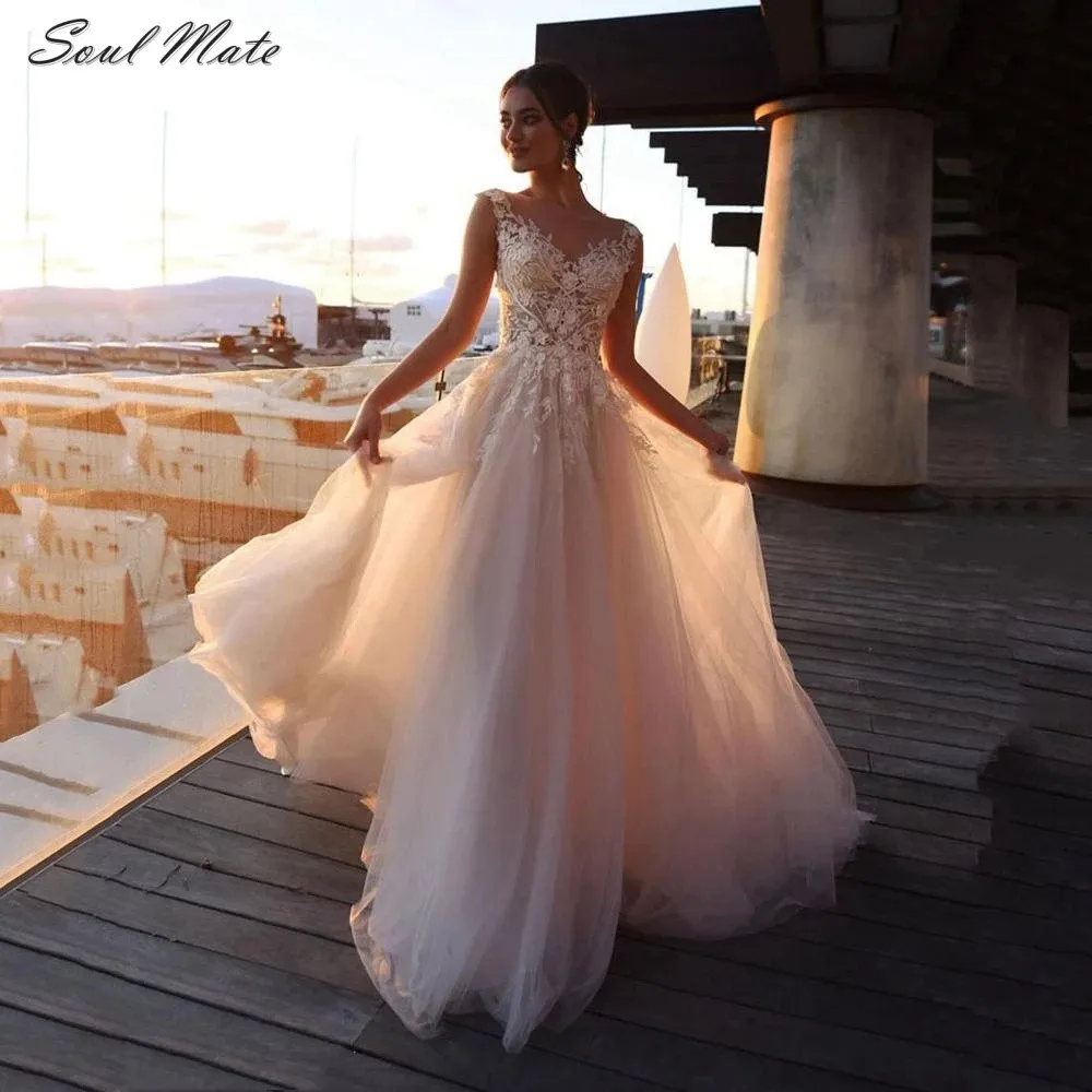 New Fashion Long Tulle A Line Wedding Dresses For Women Bride Robes Appliques Bridal Gowns Illusion O-Neck Vestidos De Novia 
New Fashion Long Tulle A Line Wedding Dresses For Women Bride Robes Appliques Bridal Gowns Illusion O-Neck Vestidos De Novia