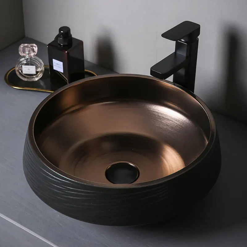 Black Table Basin Light Luxury Ceramic Bathroom Sinks modern Bathroom fixtures Black Gold Glaze Creative Wash basin Kitchen Sink
Black Table Basin Light Luxury Ceramic Bathroom Sinks modern Bathroom fixtures Black Gold Glaze Creative Wash basin Kitchen Sink