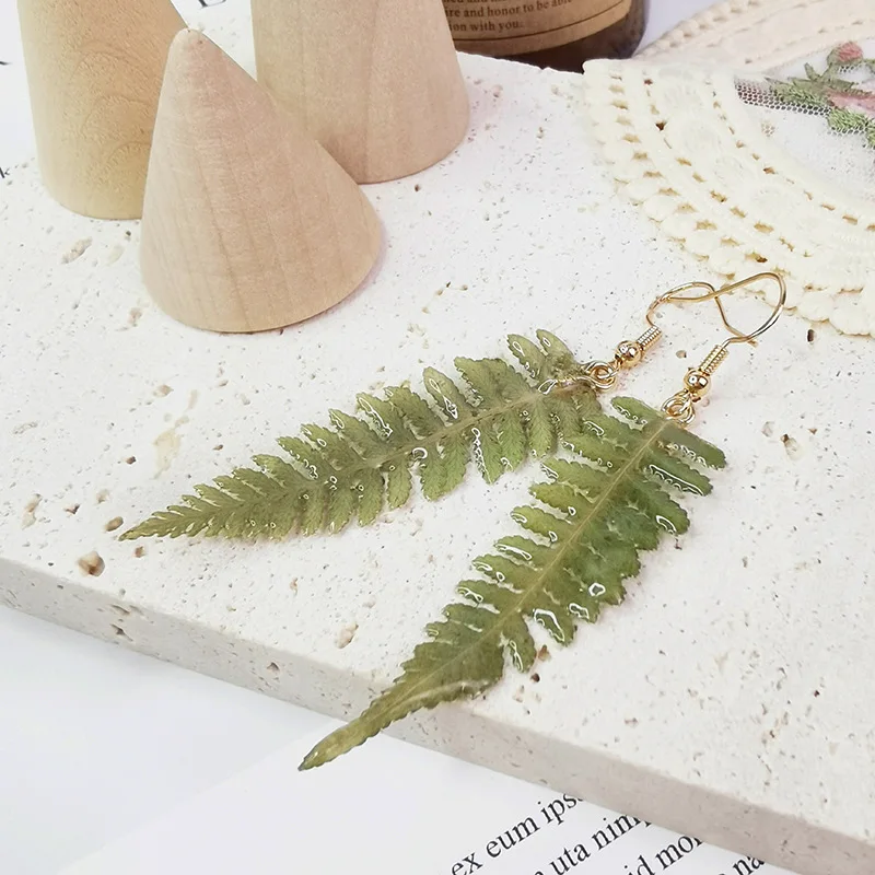 

Unique Natural Green Leaf Earrings Creative Red Maple Leaf Epoxy Resin Earring Elegant Leaves Statement Jewelry Wholesale 2024