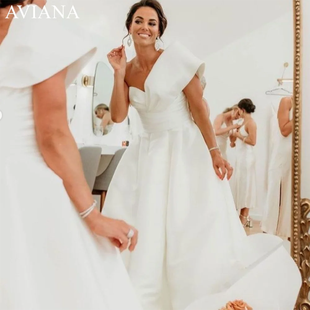 Aviana Elegant V Neck Wedding Dress 2023 Sleeveless One Shoulder Backless A Line Simple Satin Bridal Gowns Vestido De Noiva
Aviana Elegant V Neck Wedding Dress 2023 Sleeveless One Shoulder Backless A Line Simple Satin Bridal Gowns Vestido De Noiva