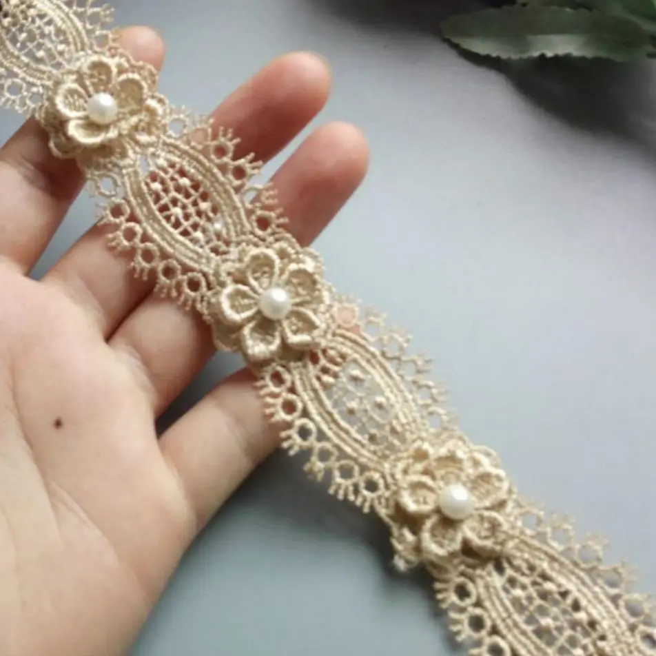 1 yard Gold Soluble Pearl Lace Trim Ribbon Flower Embroidered Fabric Handmade DIY For Costume Sewing Supplies Craft Decoration 
1 yard Gold Soluble Pearl Lace Trim Ribbon Flower Embroidered Fabric Handmade DIY For Costume Sewing Supplies Craft Decoration