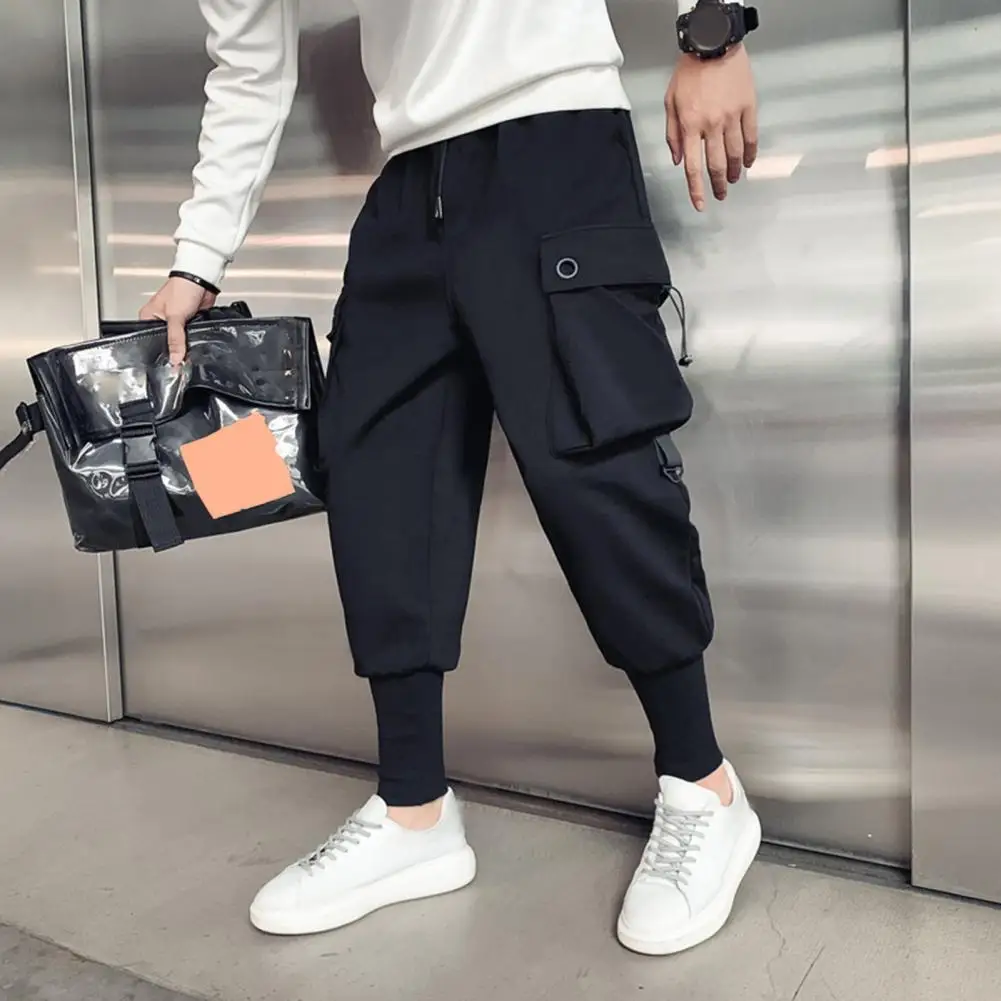 Regular Fit Men Pants Breathable Drawstring Cargo Pants with Ankle Bands Multi Pockets for Men Sport Sweatpants with for Comfort
Regular Fit Men Pants Breathable Drawstring Cargo Pants with Ankle Bands Multi Pockets for Men Sport Sweatpants with for Comfort