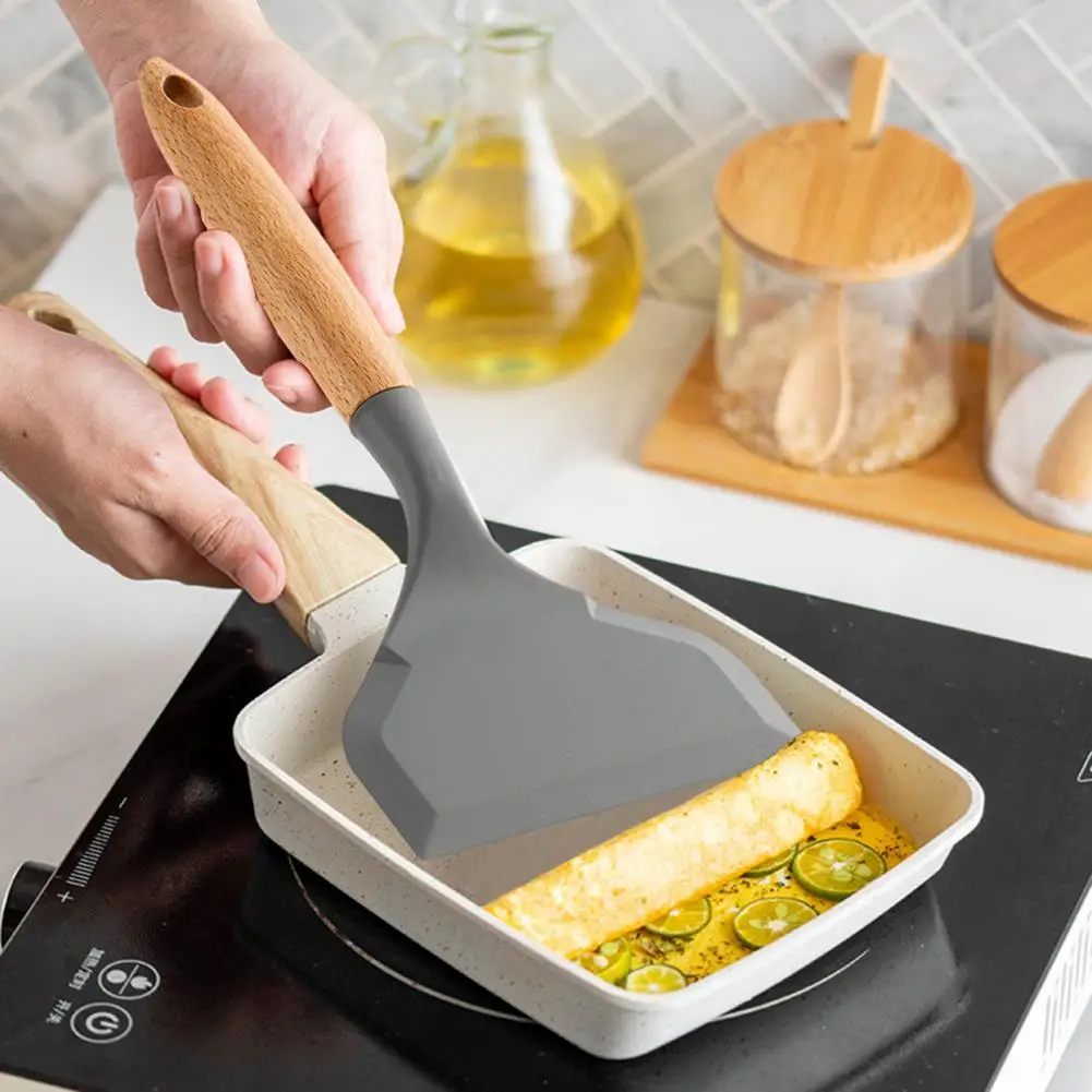 Anti-slip Handle Spatula Reusable Heat-resistant Silicone Spatula Cooking Utensils with Wooden Handle Non-stick for Cooking
Anti-slip Handle Spatula Reusable Heat-resistant Silicone Spatula Cooking Utensils with Wooden Handle Non-stick for Cooking