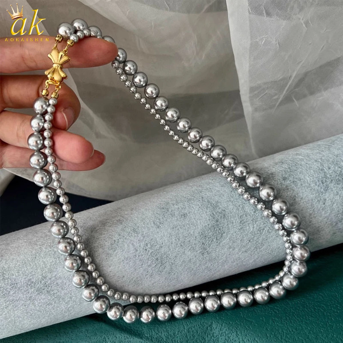 

Aokaishen Silver Gray Pearl Necklace Shell Beads for Women Versatile Niche Double Layered Sweater Chain High-end Neckchain