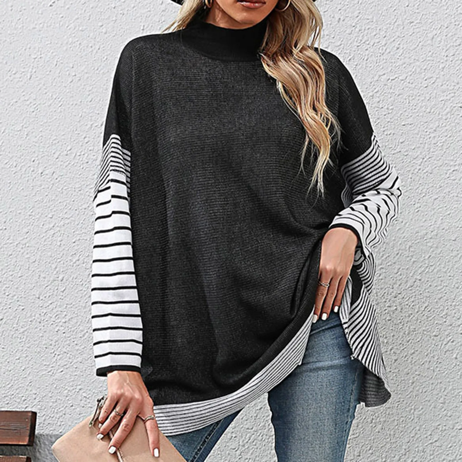 Женский трикотажный свитер с длинным рукавом и высоким воротником
Женский трикотажный свитер с длинным рукавом и высоким воротником