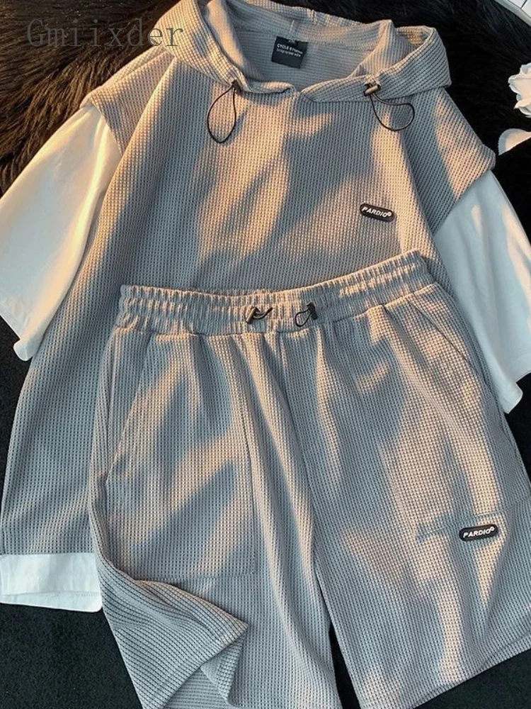 Summer Men's Large Size Sports Suit Breathable Casual Wear Wild High Street Chic Fake Two-piece Casual T-shirt + Simple Shorts
Summer Men's Large Size Sports Suit Breathable Casual Wear Wild High Street Chic Fake Two-piece Casual T-shirt + Simple Shorts