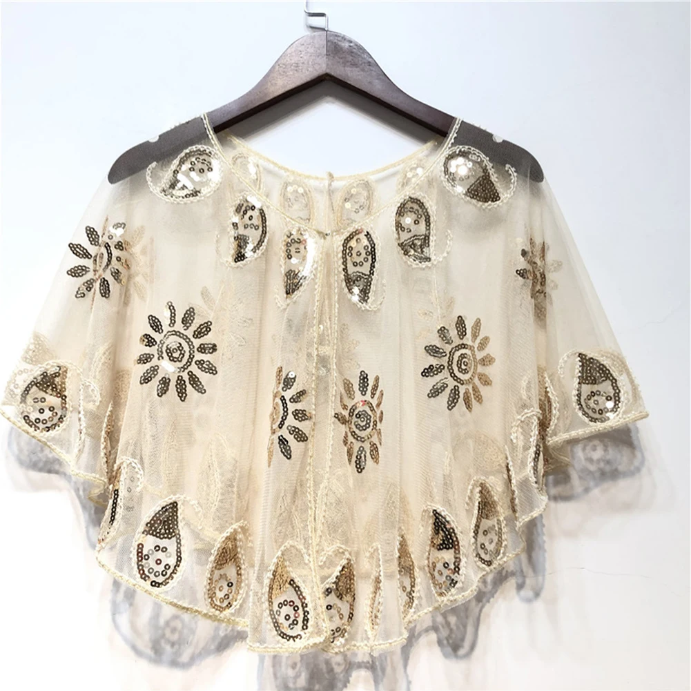 

Women Vintage Flapper Deco Evening Cape with Intricate Sequin Details Capture the essence of the 1920s with this stunning cape