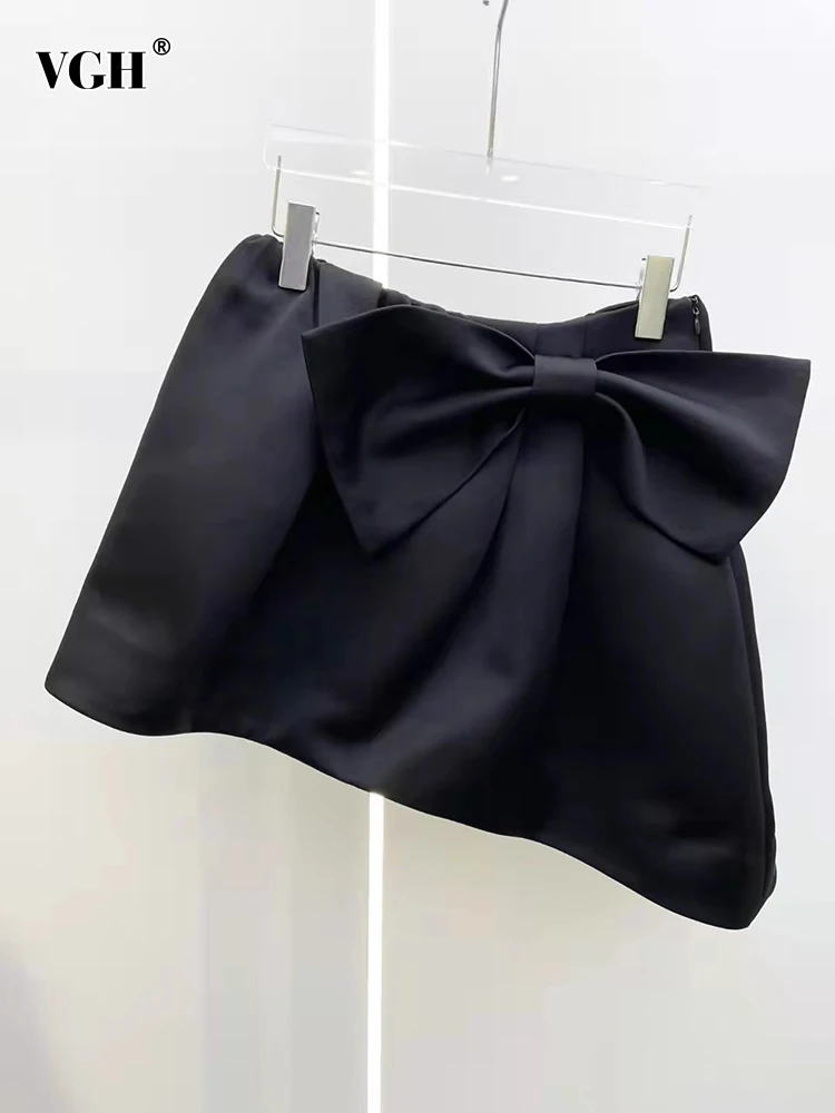 

VGH Solid Patchwork Bowknot Casual Skirt For Women High Waist Spliced Zipper Slimming Irregular Hem Mini Skirts Female Fashion