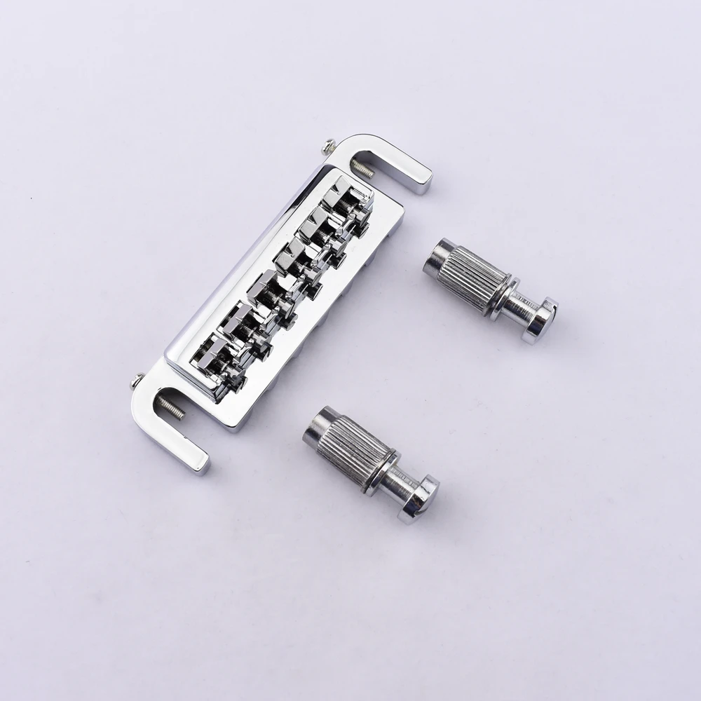 1 Set Chrome Tune-O-Matic Style Bridges & Tailpieces for LP SG Electric Guitar - Made in Korea
1 Set Chrome Tune-O-Matic Style Bridges & Tailpieces for LP SG Electric Guitar - Made in Korea