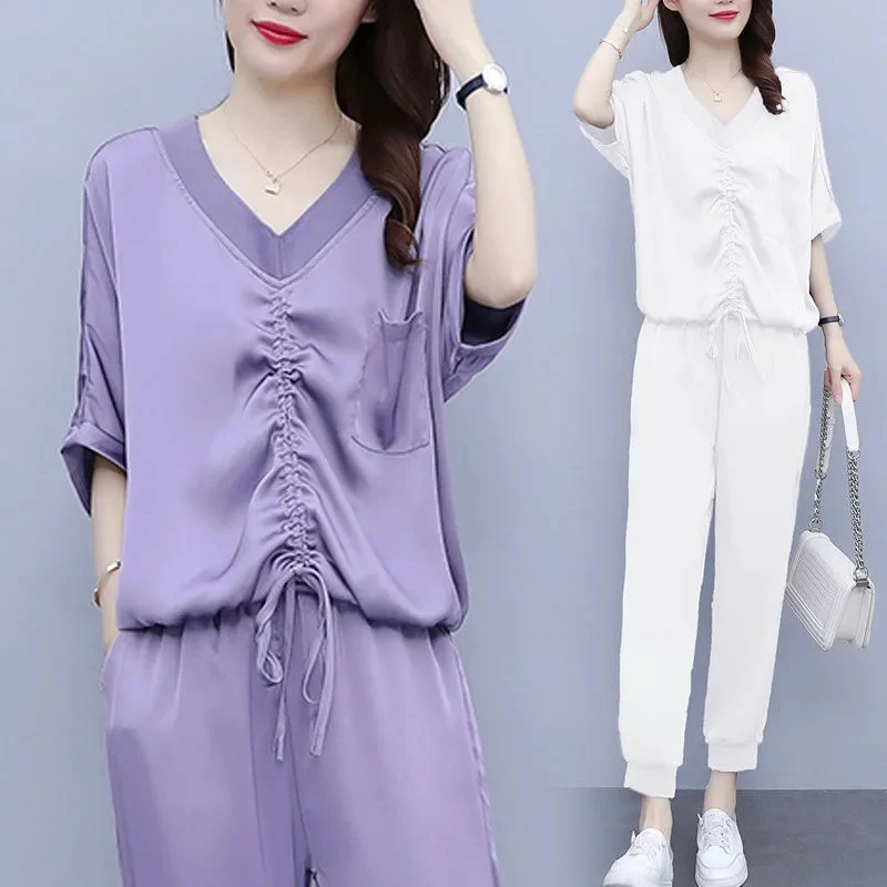 Womens Fashion Casual Two-piece Set 2022 New V Neck Drawstring Short Sleeves Tops + Loose Pants Two-piece Female Summer suit 5XL
Womens Fashion Casual Two-piece Set 2022 New V Neck Drawstring Short Sleeves Tops + Loose Pants Two-piece Female Summer suit 5XL
