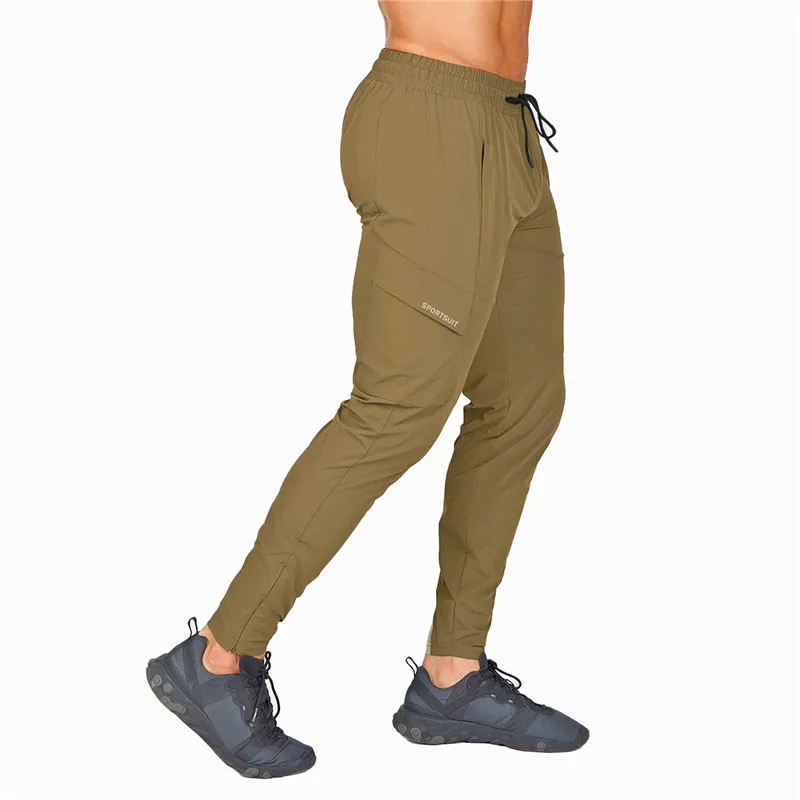 

Spring Men Women Running Sport Camping Hiking Pants Football Training Joggings GYM Sweatpants Basketball Soccer Trousers 92