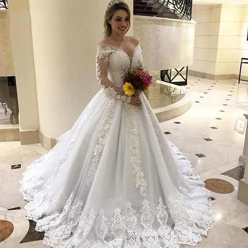 Off the Shoulder Long Sleeves Wedding Dress Plus Size Ball Gown Bridal Dresses Lace Appliques Tulle Wedding Gowns
Off the Shoulder Long Sleeves Wedding Dress Plus Size Ball Gown Bridal Dresses Lace Appliques Tulle Wedding Gowns