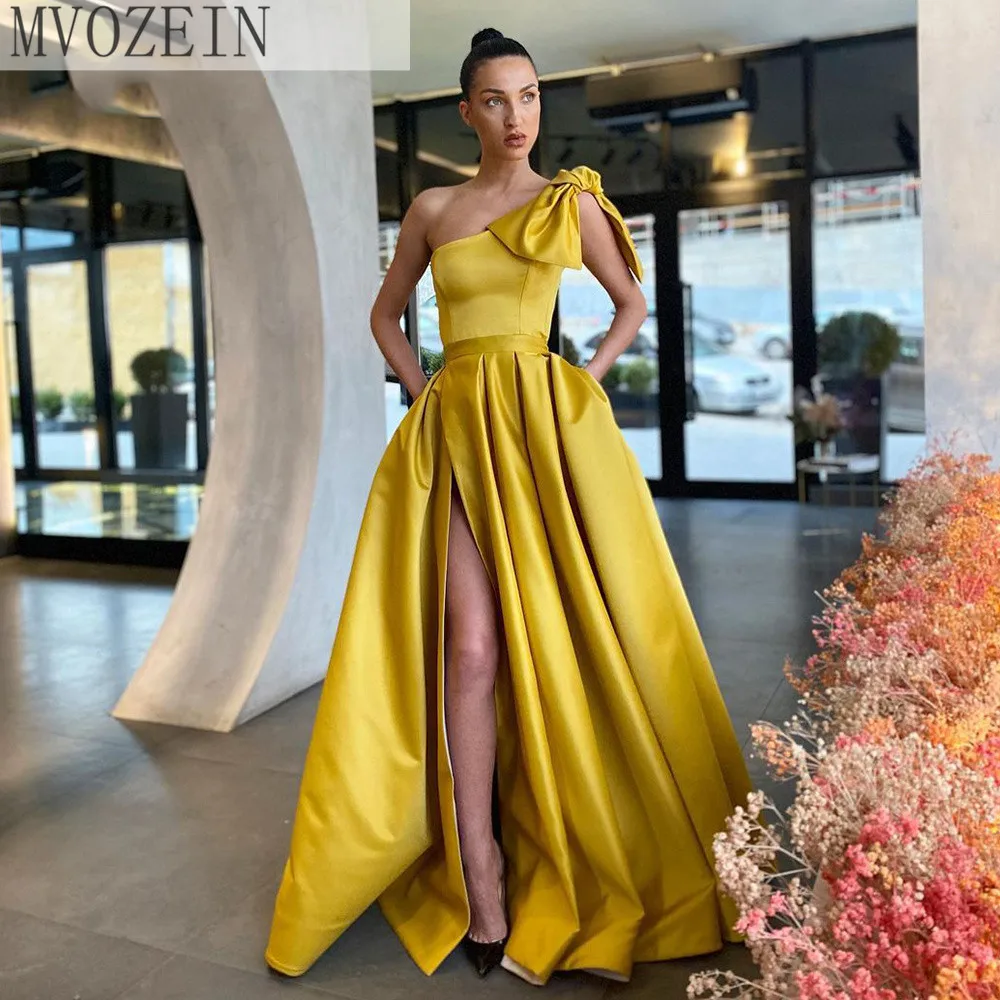 Mvozein A line Prom Dress One shoulder Bow Long Party Dresses Side Slit Evening Dresses Party Gown robe de soirée de mariage
Mvozein A line Prom Dress One shoulder Bow Long Party Dresses Side Slit Evening Dresses Party Gown robe de soirée de mariage