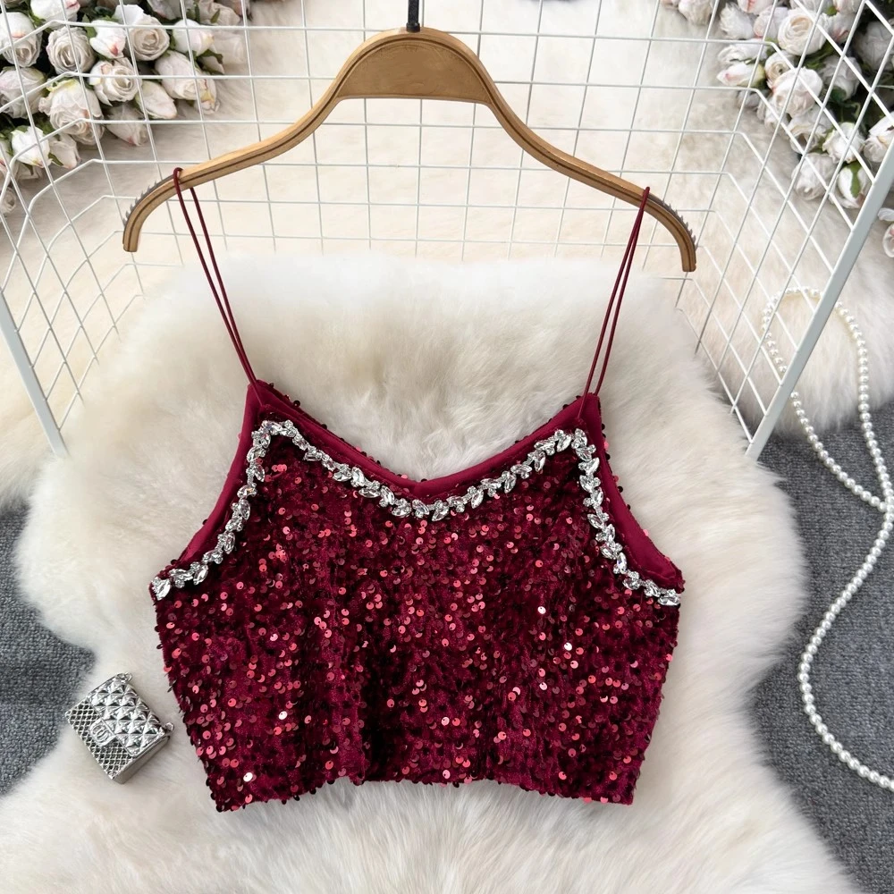 Женская блузка с блестками и открытой спиной, на тонких бретельках 
Женская блузка с блестками и открытой спиной, на тонких бретельках