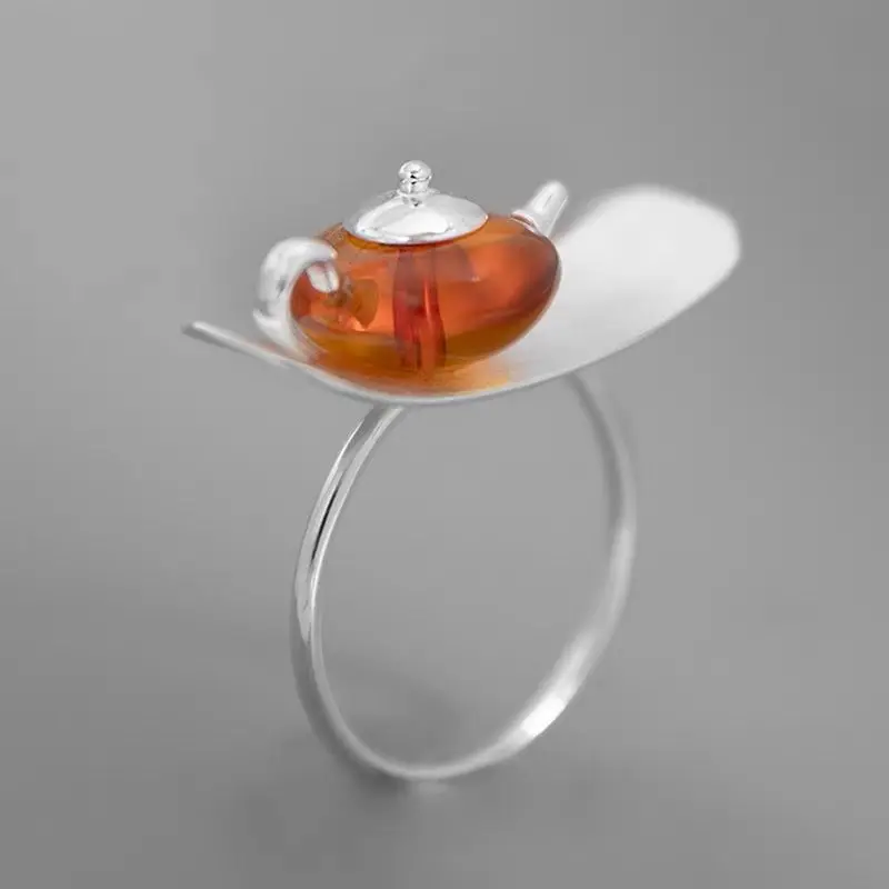 Creative Design Tea Amber Tea Pot Ring New Chinese Literature and Art Revival Tea Culture S925 Sterling Silver Ring Female
Creative Design Tea Amber Tea Pot Ring New Chinese Literature and Art Revival Tea Culture S925 Sterling Silver Ring Female