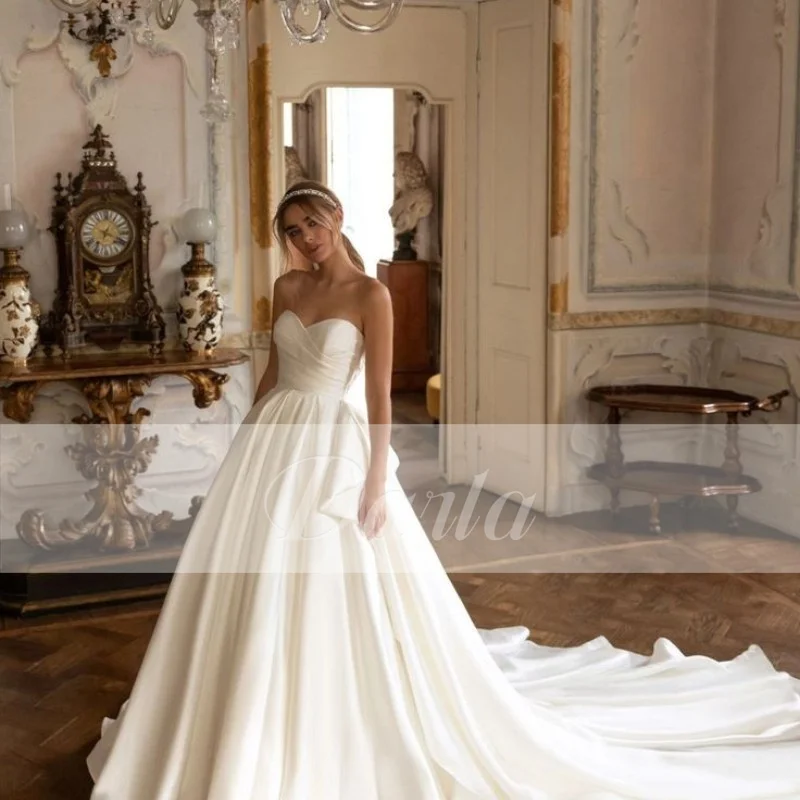 Morden Soft Satin A Line Wedding Dresses Sweetheart Sleeveless Bridal Gowns Vintage Pleat Vestido de Novia Custom Made 2023
Morden Soft Satin A Line Wedding Dresses Sweetheart Sleeveless Bridal Gowns Vintage Pleat Vestido de Novia Custom Made 2023